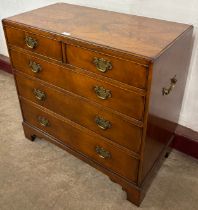 A George III style walnut chest of drawers