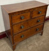 A George III inlaid mahogany chest of drawers