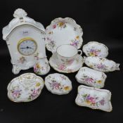 A collection of Royal Crown Derby Pinxton Rose and Derby Posies including a cup and saucer, pepper