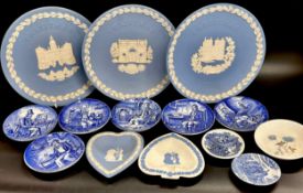 A collection of Wedgwood Jasperware blue and white; plates, pin dishes, candlestick, cup and saucer,