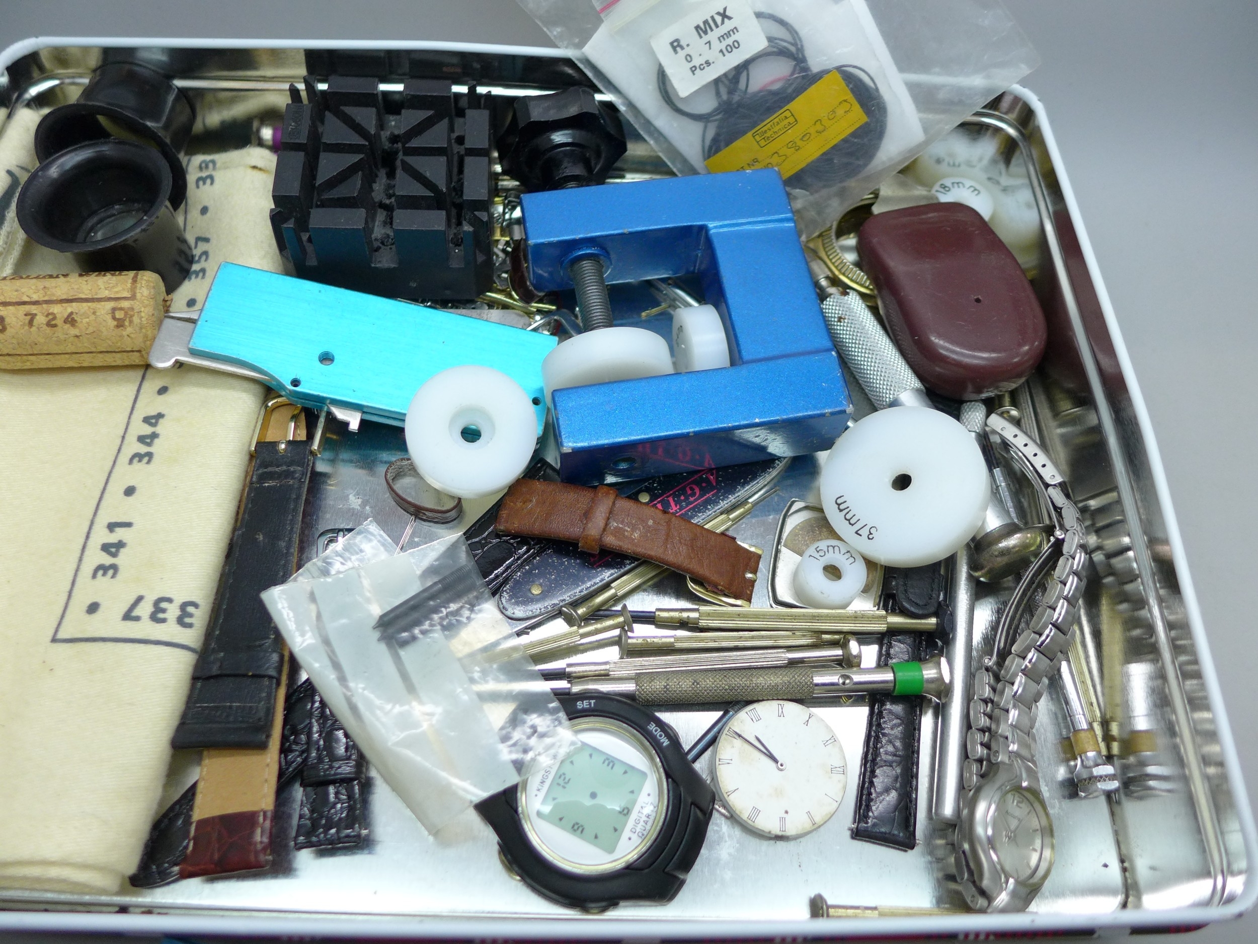 A collection of watch maker's tools
