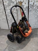 A pre-owned Evenflo Pivot Xplore all-terrain stroller/wagon.