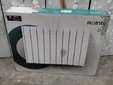 An as new Rointe Belize series 990W oil filled electric radiator, 9 elements, white.