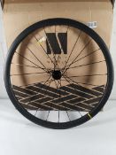 An as new Mavic Cosmic SL 32 carbon UST disc rear wheel.