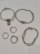 Pre-owned Pandora jewelry to include two charm bracelets, three charms, three rings and bracelet.