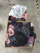 Two boxes of pre-owned Lululemon gym wear and related items (approximately 100 items).