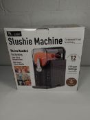 A pre-owned Slushi machine professional frozen drinks maker (box unsealed, UK adapter required).).