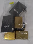 Eight pre-owned Zippo lighters and accessories (over 18s only).