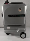 A pre-owned Airwheel Robot SE3 Mini T Smart ride on suitcase with battery.