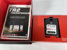 A boxed as new MyLaps TR2 Transponder (car / bike).