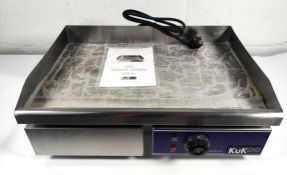 A KuKoo electric food griddle 50cm wide with instructions, boxed (10119) (requires UK adaptor).