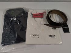 Three Hugo Boss Clothing to include The Motion dynamic jersey, Polo shirt, brown leather belt.