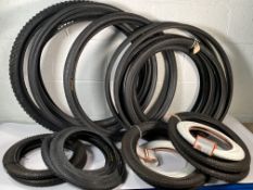 Nineteen as new and pre-owned adults and kids bike tyres to include Kenda, Continental, Bontrager.