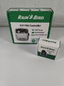 An as new Rain Bird ESP-TM2 controller and a Rain Bird LNK2 WIFI module.