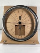 A Zipp 303 S Carbon Clincher front wheel.