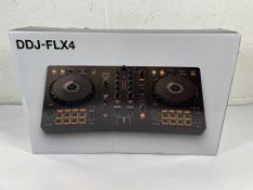 A boxed as new Pioneer DJ - DDJ-FLX4 - 2-channel DJ controller, black.