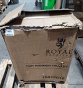 A Royal Catering cup warming trolley, slight damage/dents to outer casing and box.