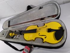 A pre-owned yellow Yamaha violin to include case and bow.
