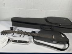 A pre-owned Enya NEXG 2 Smart Audio Guitar.