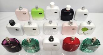 Thirty Lacoste perfumes/testers and related (please note: bottles may have been used/packaging may h