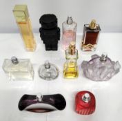 Forty perfumes/testers and related to include Jean Paul Gaultier, Estee Lauder, Burberry and Paco Ra