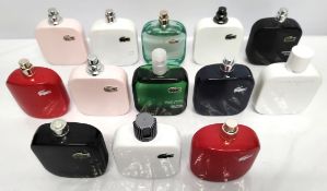 Thirty Lacoste perfumes/testers and related (please note: bottles may have been used/packaging may h