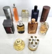 Forty perfumes/testers and related to include Boss, YSL, Versace and Burberry (please note: bottles