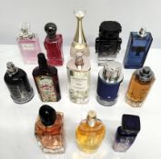 Forty perfumes/testers and related to include Paco Rabanne, Estee Lauder, Michael Kors and Ralph Lau