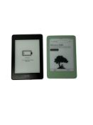 Two pre-owned Amazon Kindles.