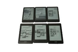 Six pre-owned Amazon Kindles (Assorted models)..