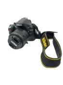 Pre-owned Nikon D5200 DSLR Camera with 18-55mm DX VR Lens, Battery, Charging Dock (EU) & Bag.
