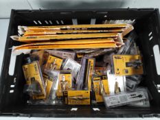 A mixed lot of as new DeWalt products including Step Drill Bit 14mm x 25mm, Self-Feed Drill Bit 57mm