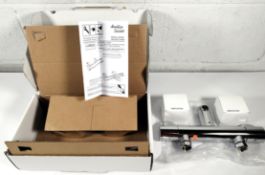 An Armitage Shanks Contour 21+ safe thermostatic chrome bath filler tap - short lever handles, boxed