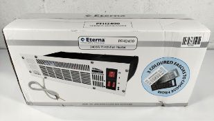 An as new Eterna PFH2400 2400W electric plinth heater with three interchangeable fascia's, minor dam