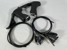 Two Shimano BR-RX810 Japan Callipers and two Shimano GRX brake levers (R, L).