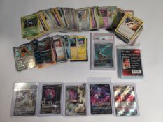 A quantity of assorted Pokemon trading cards to include a PSA graded 10 Japanese Skarmory.