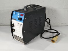 A pre-owned TIG- MAX XT 7110 Stainless Steel Cleaning Device with some accessories.