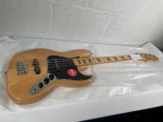 A boxed as new Squier Classic Vibe '70s Jazz Bass, natural (SN: ICSE25019875).