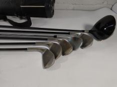 Six pre-owned golf clubs to include Taylor Made 425 driver.