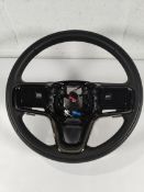 A pre-owned Land Rover/Jaguar branded steering wheel (PN R8A2-3F563-KB8PVJ).