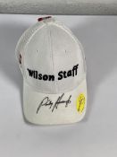 A Wilson Staff baseball cap signed by Padraig Harrington (BCVA do not guarantee authenticity of the