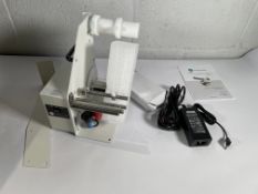 A Labelmate LD-100-RS with PSU, bracket and UK cord.