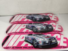 Three as new Palace Racey skateboard decks.