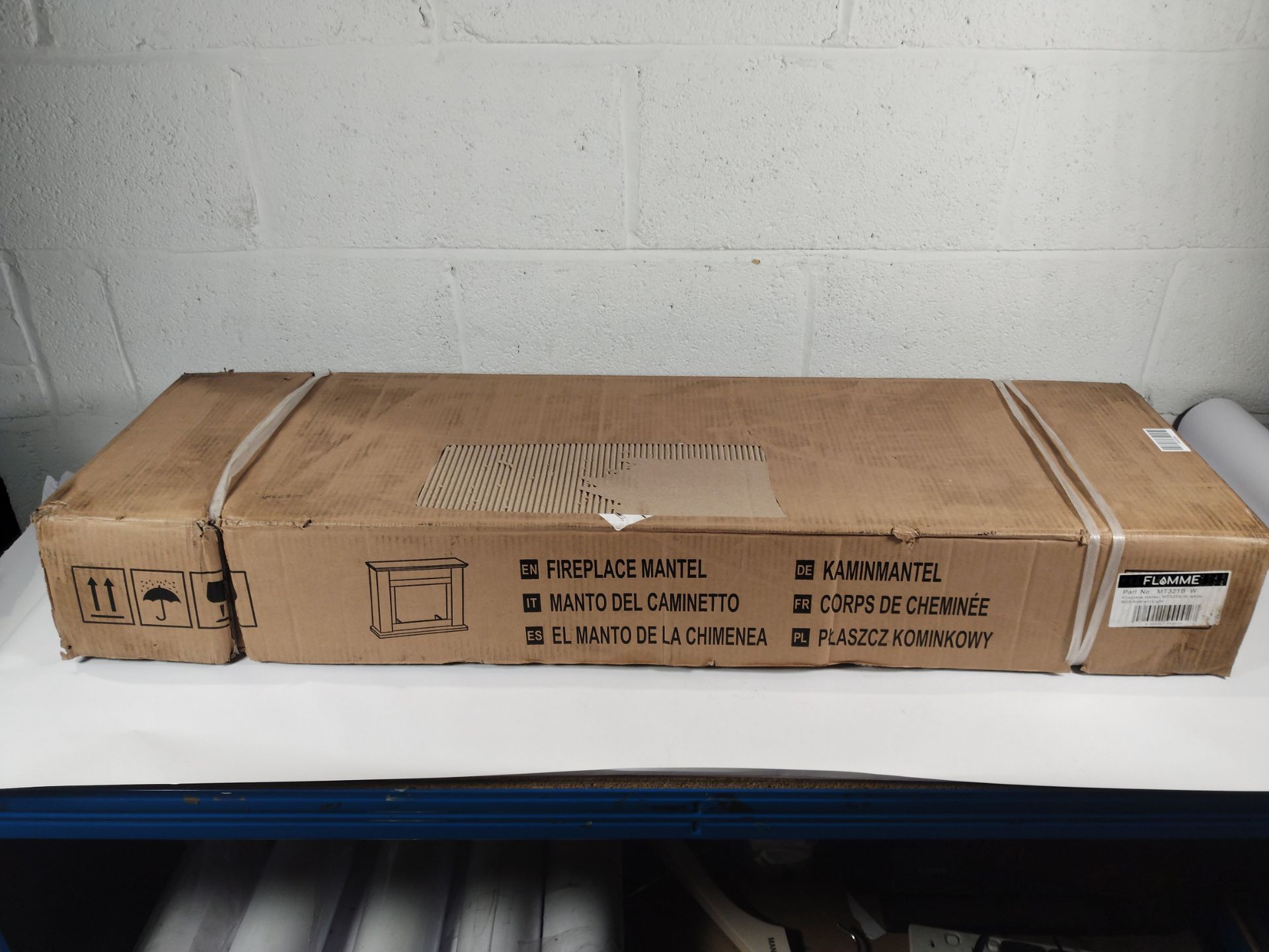 An as new FLAMME 40" Mardella fireplace surround .