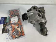 A Carwood Garrett 813860 Turbocharger with some minor damage (sold as seen).