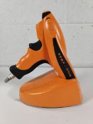 A pre-owned Stat-Gun battery ionization gun with charger.