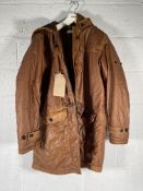 A pre-owned Stone Island Mussola Gommata Compass Patch Long Line Jacket, XXL (arm patch missing).