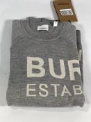 A Burberry wool jumper (XS).