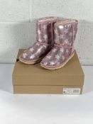 A pair of children's Ugg classic short 2 sequin star boots (UK 3).