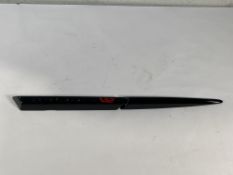 A gloss black left hand side strake assembly kit for a 2025 Aston Martin Vanquish Super GT V12.